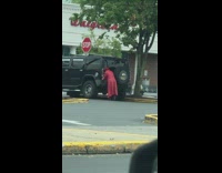 Man red coat outfit hummer photo shoot