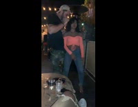 Woman change dance step when random guy approach
