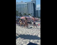 Two girls bikini drop speakers dance beach