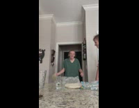 Three friends slap each other with tortillas 