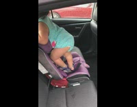 Little baby girl falls off car seat