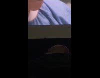 Rat runs across screen inside movie theater