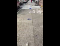 People keep place in line using clothes 