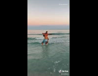 Boyfriend drops girlfriend in water hat