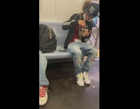 Guy Pours Substance into Paper Roll 