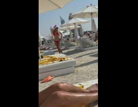 Collab IITW - Lady in Red Bikini and Santa hat Poses at Beach