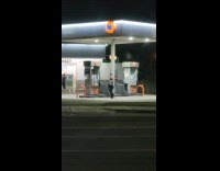 Collab IITW - Woman in white top tiktok dance at the Gas Station