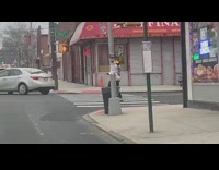 Yellow sweater guy dances on crosswalk 