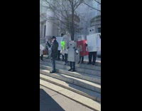 Bunch of people wear robot boxes 