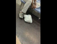 Man takes off shows and pick toes on subway train