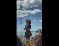 Black shirt girl gives speech peaceful protest