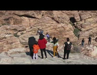 girl purple sweater canyon rocks