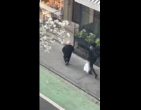 Small man about to enter little prince store