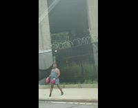 Man jumpsuit pineapple on head boxing gloves street