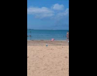 Woman in bikini walk for beach video
