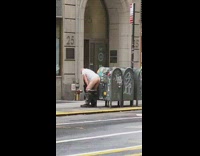 White shirt guy moons street yellow curb 