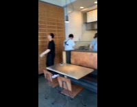 Man tiktok video while in restaurant line