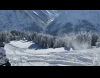 Guy on skis does double backflip mountain 