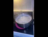 Pot boils and spins top of stove