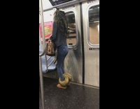 Woman raps at her own reflection through the window on a subway train #BluePointWhatTheL