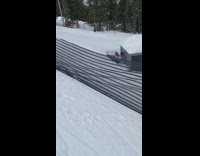 Snowboarder jumps fence but lands on box fail