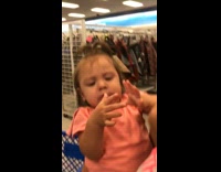 Baby girl pink shirt scared of bubble