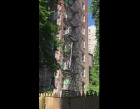 Each person passes wooden planks to floor above them 
