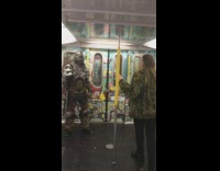 Collab Subway Creatures - Woman green jacket accuses warrior monster in armor of cheating on her in subway train