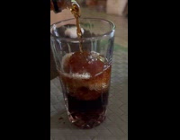 Soda poured in glass turns into ice