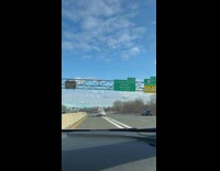 Police Car Swerves Gently and Slowly at Expressway