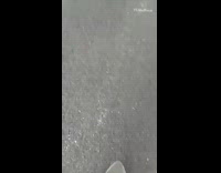 Penny Board Skates Down Green Hill and Drops Camera