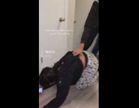 Man Pulls Lady on the Foot out of Room