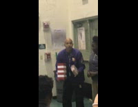 Bald guy opens present and someone says its some hair 