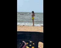 ClipsIG - Girl Kid Picks Wet Sand and Put on Bra and dances