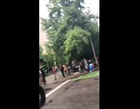 Peaceful protest in rain cars honk support