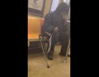 Man black hoodie smoke inside the train