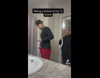 Guy pranks girlfriend in bathroom 