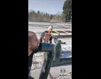 Guy karaokes into plumbing pipe on roof