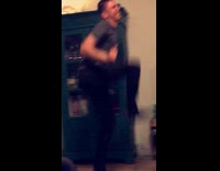 Guy drunk dancing in living room