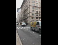 Van parade down new york streets