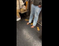 Collab Subway_Creatures - Man barefoot stands inside the subway train