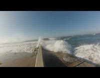 Collab Kook Of The Day - slo mo wave crashes into surfer on concrete
