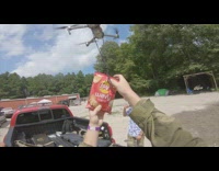 Drone deliver lay chips to airsoft guy