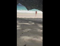 Couple in beach outfit romantic photoshoot with a kiss