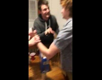 Friends try to get drunk friend to stop holding onto plant 