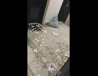 ceiling broken rain water leaks into apartment