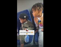 Brothers sit on bus and look at womans butt