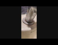 Small ant circles the faucet and moved by the filmer