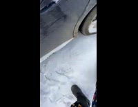 Parked blue car makes loud noise snow 