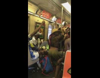 Group of guys have a twerking dance party on the subway